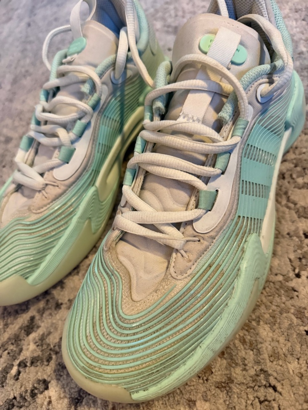 Adidas Exhibit Select 2.0 basketball shoes in the Crystal Jade colorway